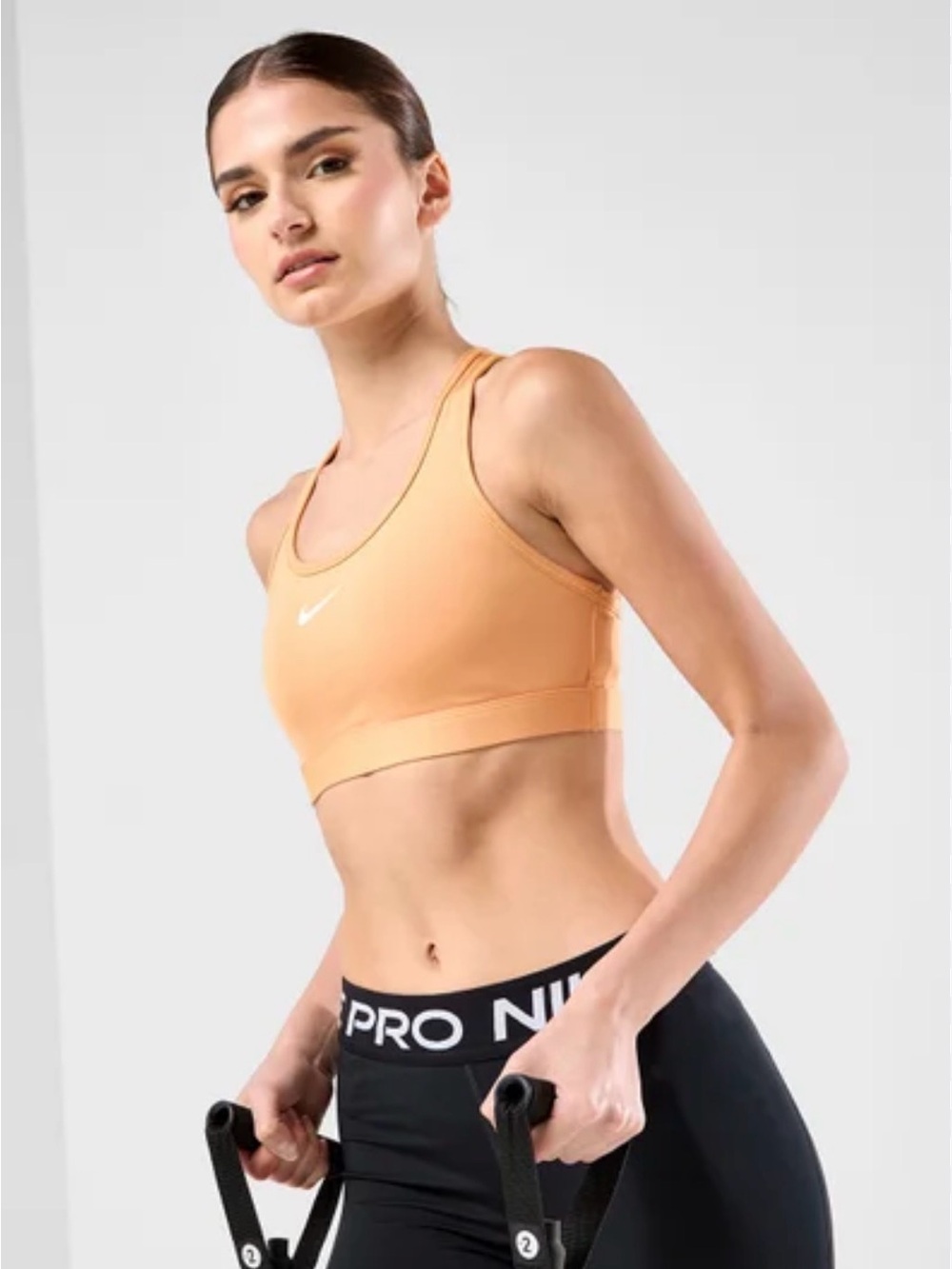 Nike Swoosh Womens Medium Medium Support Padded Racerback Sports Bra Copper Moon